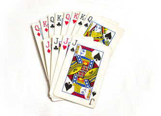 Playing cards with king, queen and joker without background, isolated
