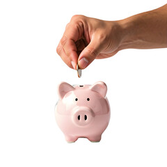 A hand deposits a coin into a pink piggy bank. The piggy bank is cartoonish and has a smiling face. The background is transparent, emphasizing the action of saving money.
