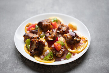Thai cuisine:grilled ribs with lemon and chili