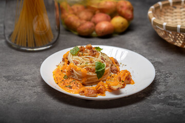 pasta with orange sauce and mint