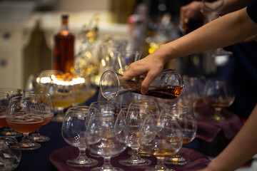 bartender pouring cocktail