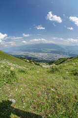 View of the city of Innsbruck, Austria from Nordkette mountain chain; fisheye perspective