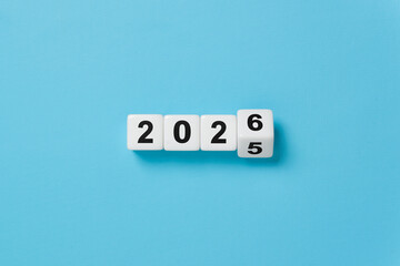 Flipping of 2025 to 2026 on dice for preparation new year change and start new business target strategy concept