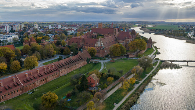 Aerial view of Malbork Castle along the Nogat River in Poland