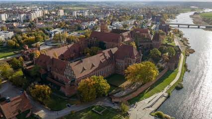 Aerial view of Malbork Castle along the Nogat River in Poland
