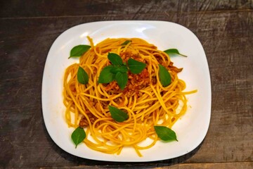 The most traditional spaghetti bolognese, well-lit and well-framed photo