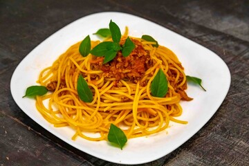 The most traditional spaghetti bolognese, well-lit and well-framed photo