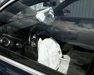car with its opened airbags due frontal impact