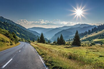 Naklejka premium Mountain Road Under Bright Sunlight With Lush Green Forest and Blue Sky