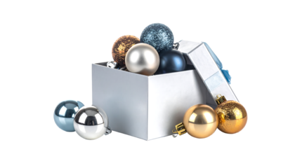 Silver box filled with gold, blue, and silver christmas ornaments on a white background, cutout