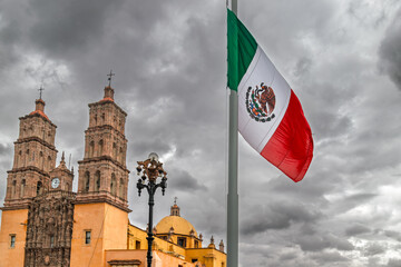 Mexican flag in front of Parish of Our Lady of Sorrows in Dolores Hidalgo
