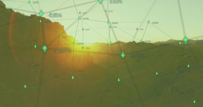 Fototapeta Displaying network graph overlaying valley at sunset, with green nodes and downward arrows