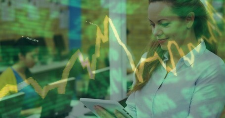 Studying white-shirt woman analyzing tablet at desk, with teen colleague chart overlays copy space