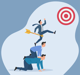 Teamwork in business: professionals form a human pyramid, top one leaps with arrow towards bullseye, symbolizing collaboration for goal achievement