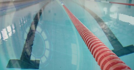 Showing red rope extending from right pool lane, with floor stripe, water reflections, copy space