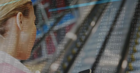 Uniformed pilot checking throttles while holding smartphone in cockpit, error codes, copy space