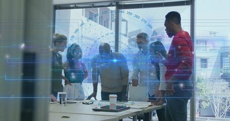 Collaborating project team pointing at laptops in conference room, with digital data overlay