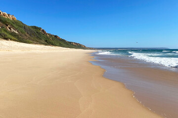 Sandy beach on the Atlantic ocean coast in Portugal, Algarve