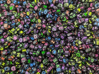 Colorful Alphabet Letter Beads Background