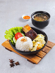 Indonesian Grilled Beef Ribs with Rice, Omelette, and Soup – Traditional Nasi Iga Bakar Asian Cuisine Food Photography