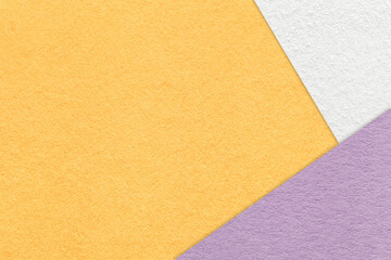 Abstract pastel yellow, white and lilac paper background with copy space. Template for presentation, banner