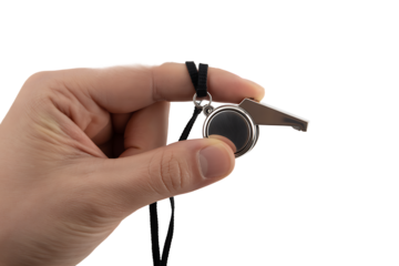 Hand holding small silver whistle isolated on white background
