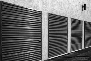 Side View of Closed Sliding Black Metal Doors in Black and White.