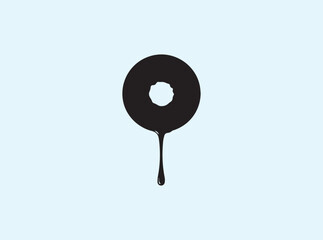Minimal Doughnut Silhouette with Single Black Drip Isolated on White
