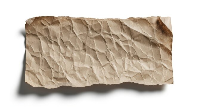 A crumpled piece of aged brown paper isolated on white background