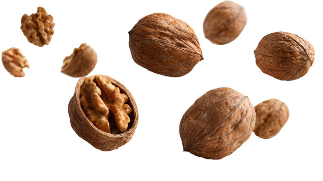 Whole and crushed walnuts close-up in the air on a white background - Powered by Adobe