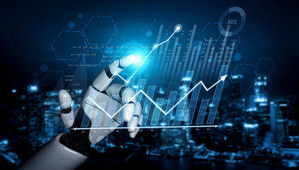 A robotic hand reaches out to interact with digital graphs depicting data analytics, illuminating...