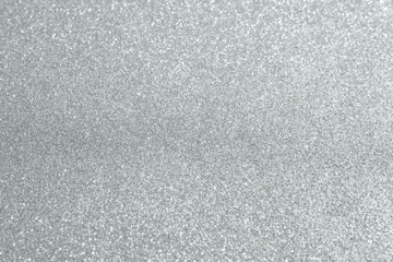Abstract silver glitter sparkle texture with bokeh background