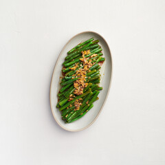 Asian style green beans with sesame and garlic, top view