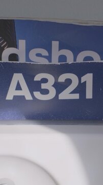 Close-up of A321 model detail with sunlight on sign