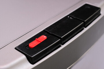 Hot water safety panel button on the water dispenser