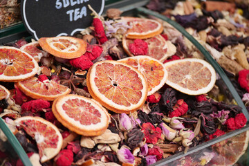 Colorful dried fruits and flowers for herbal teas on display
