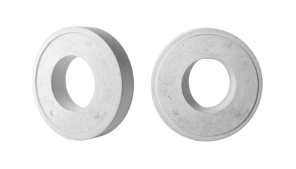 Two white, concrete tori sit against a black background