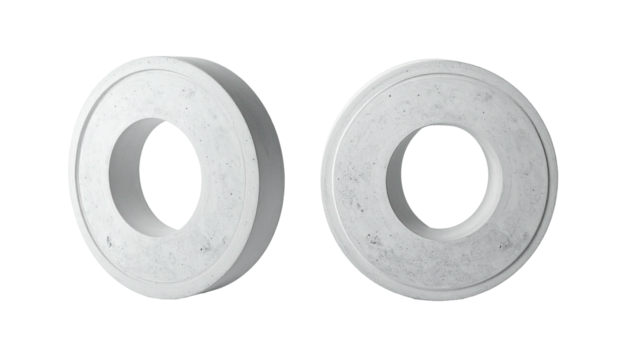 Two white, concrete tori sit against a black background