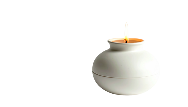 Small, round, white candle holder burning against a black background