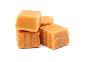 Caramel candies isolated on white background