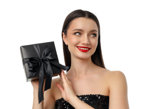 Joyful woman showcases a chic Black Friday gift, isolated, PNG
