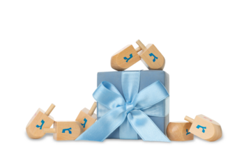 Dreidels around a blue ribboned gift box, isolated, PNG