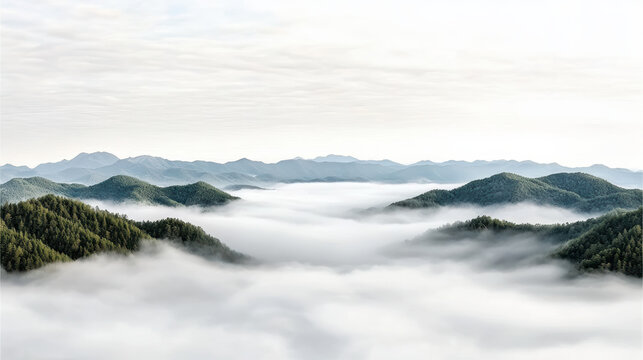 Misty landscape with rolling hills and clouds creating serene atmosphere