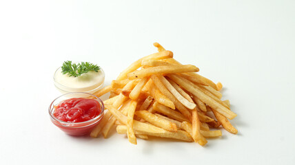pile of french fries with chili sauce and mayonnaise sauce in a clear bowl on a white background
