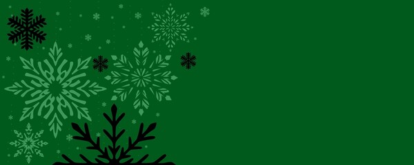falling mint and black snowflakes on forest green winter background with pine branches