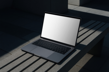 Sleek laptop mockup on outdoor bench png, transparent design