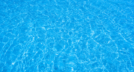 Deep sea waves. The surface of the blue sea has ripples and light reflecting on the sea.