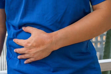 Liver-related abdominal pain from alcohol drinking and fatty diet—symptoms may include bloating, nausea, and upper right quadrant tenderness.