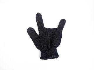Black knit glove making the I Love You hand sign. Symbol of love and communication. Isolated on white.