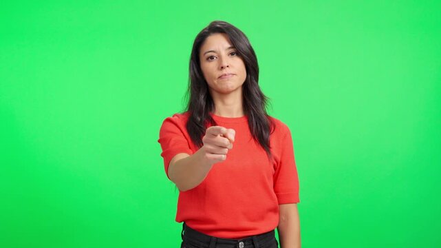 Woman blaming and gesturing on green screen background